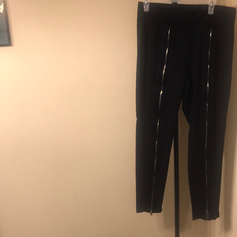 Black front zippered fitted pants